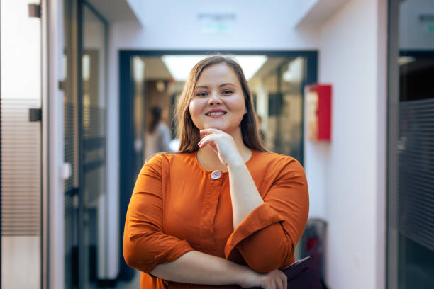 Young female entrepreneur happy back to work after pandemic